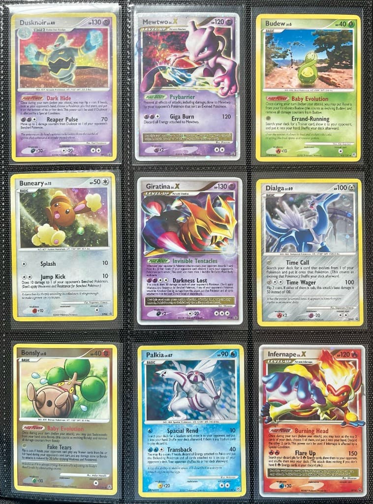 Photo of a Pokémon binder page filled with Diamond & Pearl-era cards